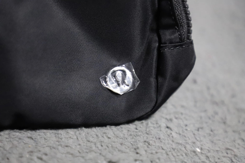 NWT Lululemon Everywhere Belt Bag 1L Black/White Wordmark Crossbody Waist Pack