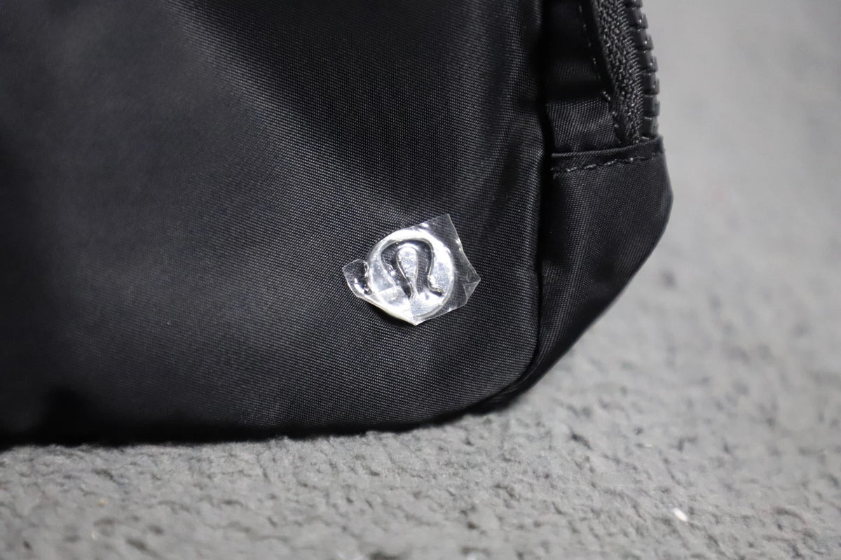 NWT Lululemon Everywhere Belt Bag 1L Black/White Wordmark Crossbody Waist Pack